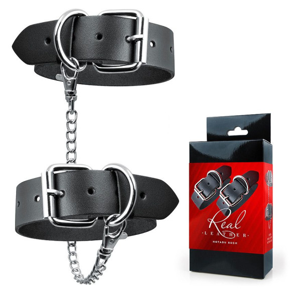 Черные кожаные оковы в в минималистичном дизайне Черные кожаные оковы в в минималистичном дизайне