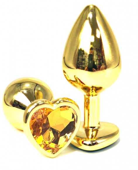 Золотистая анальная пробка с оранжевым кристаллом-сердцем - 7 см.