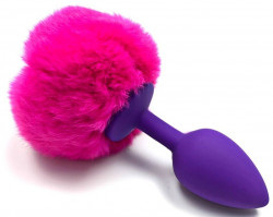 Фиолетовая силиконовая анальная пробка с розовым хвостиком зайки Фиолетовая силиконовая анальная пробка с розовым хвостиком зайки