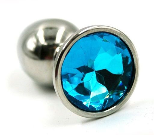 Серебристая анальная пробка с нежно-голубым кристаллом - 7 см. Серебристая анальная пробка с нежно-голубым кристаллом - 7 см.