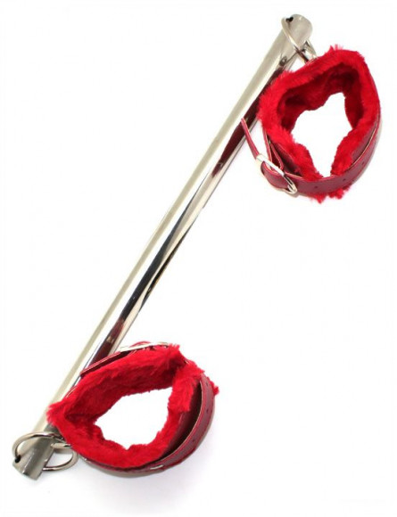 Распорка на руки с красными наручниками Распорка на руки с красными наручниками