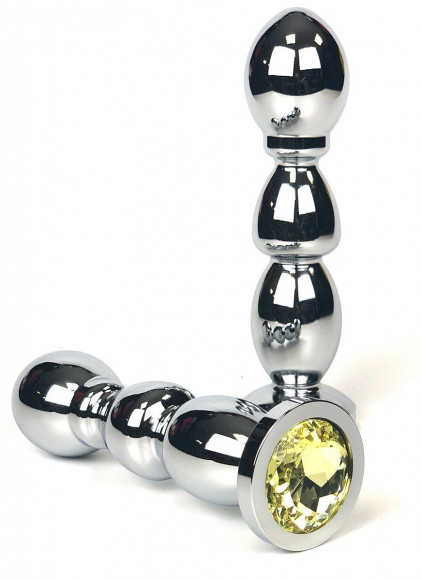 Серебристая анальная пробка-ёлочка с желтым кристаллом - 12,5 см. Серебристая анальная пробка-ёлочка с желтым кристаллом - 12,5 см.