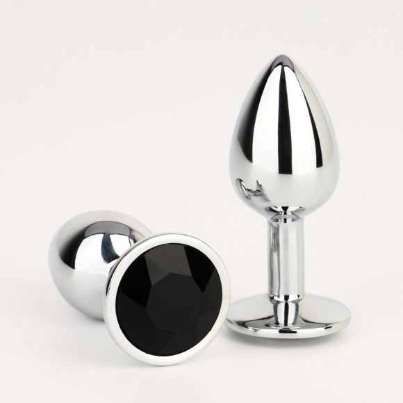 Серебристая анальная втулочка с черным кристаллом - 7 см. Серебристая анальная втулочка с черным кристаллом - 7 см.