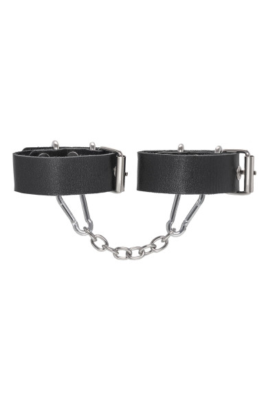 Черные кожаные наручники-браслеты из одного ремешка с люверсами Черные кожаные наручники-браслеты из одного ремешка с люверсами